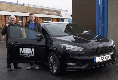 Richie Hogan collects his new 171 Ford Focus ST from Michael Lyng